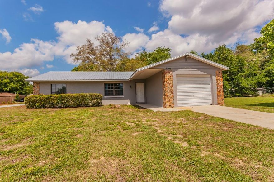 Located on a desirable corner lot in the quiet neighborhood of Lake Weir Gardens, this well-maintained 3-bedroom, 2-bathroom home offers approximately 1,100± sq ft of comfortable living space.Enjoy the functional split floor plan, with tile flooring throughout—ideal for easy maintenance. The bright kitchen includes major appliances (Refrigerator, Dishwasher, and Oven/Range) and has a cozy area for a breakfast table, perfect for enjoying your morning coffee.Through the sliding glass doors, step into a partially fenced backyard, offering space for relaxation or light outdoor activities.Don’t miss your chance to own this great property—schedule your private showing today!