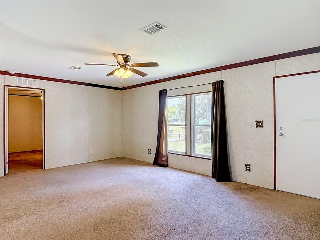 Photo of 40628 Palm Drive, Eustis, FL 32736 (MLS # G5115039)