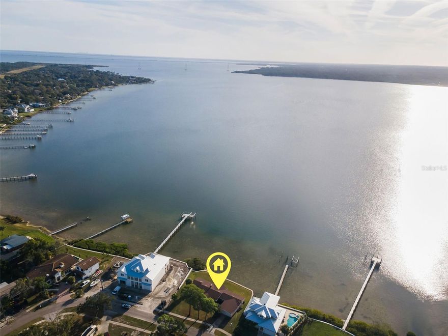 Auction Property. AUCTION! Sold free and clear of all liens. Listing price is the opening bid at the auction. Auction held live on site at the house SAT FEB 7th at 10am. Exceptional Waterfront Opportunity in Oldsmar! Welcome to 116 Shore Drive Place, a rare chance to own a beautiful waterfront lot in one of Oldsmar’s most desirable coastal settings. This property offers Stunning water views with 135ft of direct bay frontage on over 1/3 of an acre, creating the perfect backdrop for a custom-built dream home. The existing house on the property sustained flooding and is being sold as-is, presenting an ideal teardown or major renovation opportunity for buyers looking to maximize the full potential of this prime location. Enjoy peaceful surroundings, breathtaking sunsets, and the Florida waterfront lifestyle just minutes from parks, dining, and major Tampa Bay conveniences. Whether you’re a builder, investor, or future homeowner, this lot is all about location, views, and limitless possibilities. Truly one of the most Gorgeous waterfront views you will find anywhere in Tampa Bay!