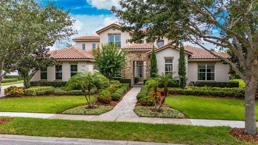 Welcome to a truly exceptional home nestled in the sought after country club golf community of Keene's Pointe.
MODERN and ELEGANT this house features 5 bedrooms, 5.5 baths, 3 car garage and paver driveway to add to the curb appeal.  Master Bedroom, plus 3 en-suites located downstairs. Upstairs you will find 1 full en-suite and a large bonus room with wet bar, microwave and 2 wine coolers. Master has His and Hers Custom walk in closets. Gourmet kitchen presents an oversized Island, gas cooktop,  Stainless Steel appliances WOLF and SUB-ZERO, stylish back splash and a hidden large pantry.  Absolutely luscious Landscaping. Outdoor living is everything you can ask for with fully equipped summer kitchen, brand new barbcue, fridge, extensive covered lanai, electric remote screens and pool area;  a welcome retreat for the family and guests. 
It also has Tesla charger, new pool motor, new water softener, and house automation that controls lights, lawn irrigation, pool automation, smoke alarme detector, smart home sound system, fans, AC thermostats, code door lock and garage door.
Within Keene’s Pointe is The Golden Bear Club, 18-hole Jack Nicklaus Signature GOLF COURSE - the centerpiece of this awesome community. This exclusive private country club also has world-class tennis courts, pool and fitness facilities, being bordered by the Butler Chain of Lakes featuring impressive oak trees and natural flora. Numerous community parks and playgrounds throughout the neighborhood. This is a fabulous house in an outstanding Golf Community. Call for your private showing.