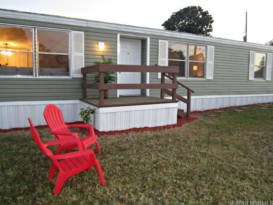 Completely remodeled and move-in ready with fenced back yard with deck. Soothing, neutral color theme throughout. This beautiful home offers three bedrooms, (split bedrooms) 2 large, full baths, plus two living areas. Large kitchen with all new appliances and white Shaker-style cabinets. In-door laundry right off the kitchen. This home is so bright and open with great flow for entertaining. Everything is new so no worries for years to come. Located in the sought-after Port Orange school district - so great for families or someone looking for their vacation home close to the beaches of Daytona and New Smyrna. No LOT RENT - you own the land. See it, Love it, Own it !!! ;Water: City