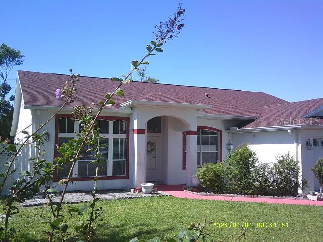 Photo of 956 Yellowbird Avenue, Deltona, FL 32725 (MLS # TB8553891)
