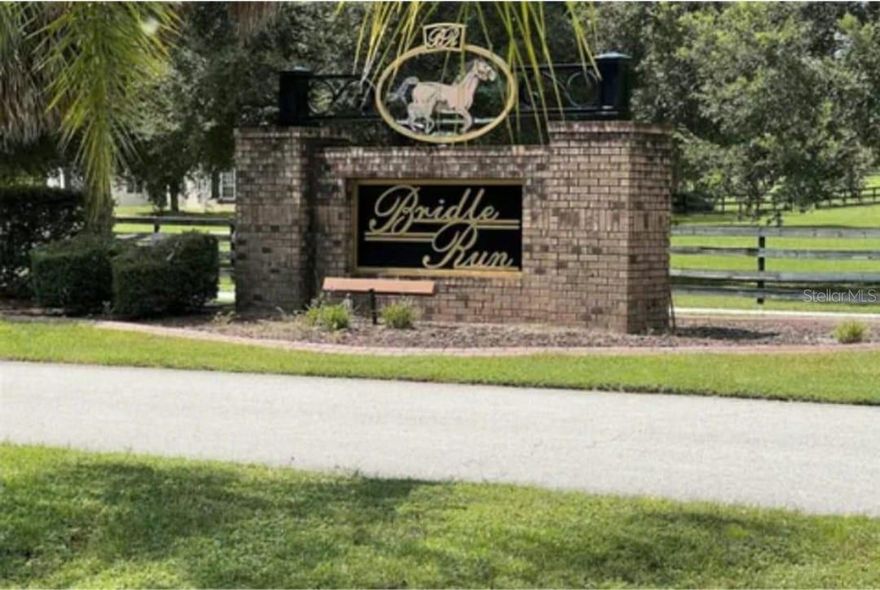 Nestled in South Ocala, this exceptional 5-acre property offers a rare opportunity live in Bridle Run and create your very own dream estate. This parcel is the last vacant lot. Boasting a prime location and featuring a tranquil pond, this piece of paradise is perfect for those seeking a serene and spacious retreat. You will have plenty of space for outdoor activities, gardening, or simply enjoying the Florida sunshine. With 5 acres of prime Florida real estate at your disposal, your imagination is the only limit. Whether you envision a sprawling ranch-style residence, a cozy cottage, or a modern architectural masterpiece, this blank canvas is ready for your unique vision. If you're an equestrian enthusiast, you'll be delighted to know that this property is horse-friendly. There's ample space to create your very own horse haven with room to spare for stables and pasture. The Bridle Run community offers a bridle path throughout the perimeter of the property. Ocala is renowned for its equestrian culture and natural beauty. This property is ideally situated within easy reach of Ocala's vibrant downtown, top-rated schools, shopping, dining, and entertainment options. Plus, you'll have convenient access to some of Florida's most pristine natural parks and trails. Whether you're traveling to nearby cities or need quick access to major highways, this property's central location provides easy connections to major routes, making commuting a breeze. Don't miss out on this incredible opportunity to own a slice of Ocala's finest real estate. With horses allowed, a beautiful pond, and endless possibilities, this 5-acre property is your chance to create the lifestyle you've always dreamed of. Contact us today to schedule a viewing and start turning your dreams into reality in Ocala, Florida.