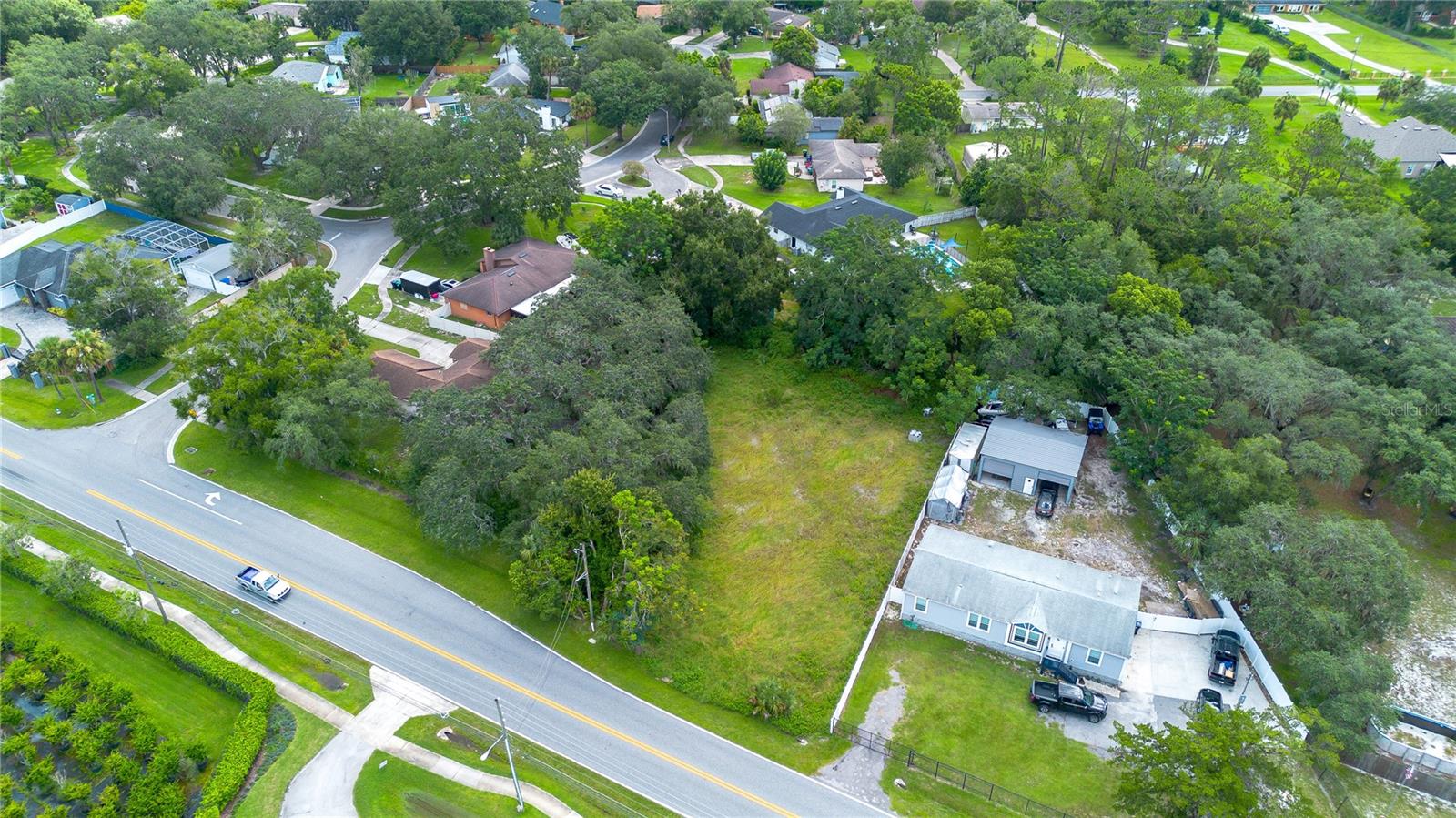 Rare opportunity to own a .51-acre homesite in the sought-after Lake Pickett area of Central Florida. This rear-positioned parcel offers enhanced privacy in a tranquil setting while maintaining exceptional connectivity. Approximately 30 minutes to the Atlantic Ocean, downtown Orlando and Lake Nona Medical City, and just a short drive to Avalon Park and Waterford Lakes for shopping, dining and community events. The location provides convenient access to premier beaches, world-class healthcare, and vibrant urban amenities. Close to top-rated schools, entertainment venues and recreational opportunities, this property is an ideal canvas for building a custom residence or holding as an investment. No HOA restrictions. Buyer to verify zoning, building requirements and utility connections.