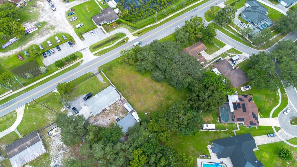 Photo of 2233 Lake Pickett Road, Orlando, FL 32826 (MLS # S5132240)