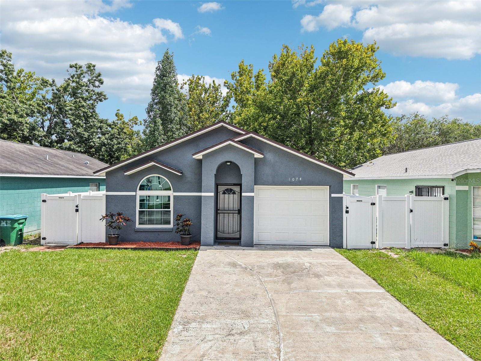 Welcome to this beautifully maintained 3-bedroom, 2-bathroom home that blends comfort, convenience, and an unbeatable location. From the moment you step inside, you’ll notice the inviting layout featuring a spacious living area filled with natural light and a functional kitchen equipped with newer stainless steel appliances—perfect for everyday living and entertaining alike. The home sits on a fully fenced lot with durable vinyl fencing, offering both privacy and a secure space for pets or play. Just beyond your backyard, enjoy direct access to a public playground—an ideal setup for families or anyone who loves being outdoors without losing the comfort of home. With a low HOA and a prime location, this home offers easy access to some of the area’s most exciting new developments and local favorites. You’ll be just minutes from the brand-new Lifetime Fitness currently under construction, the state-of-the-art HostDime data center, Winter Park Village, Whole Foods, and Amtrak. Plus, with quick access to I-4, commuting and weekend getaways are a breeze. Whether you’re a first-time buyer, downsizing, or looking for a solid investment in a growing area, this property offers the perfect blend of value, lifestyle, and location. Don’t miss your chance to make it yours!