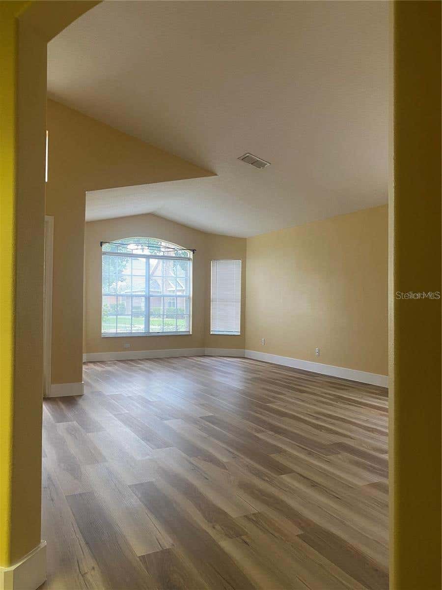 Photo of 10007 Doriath Circle, Orlando, FL 32825 (MLS # O6426271)