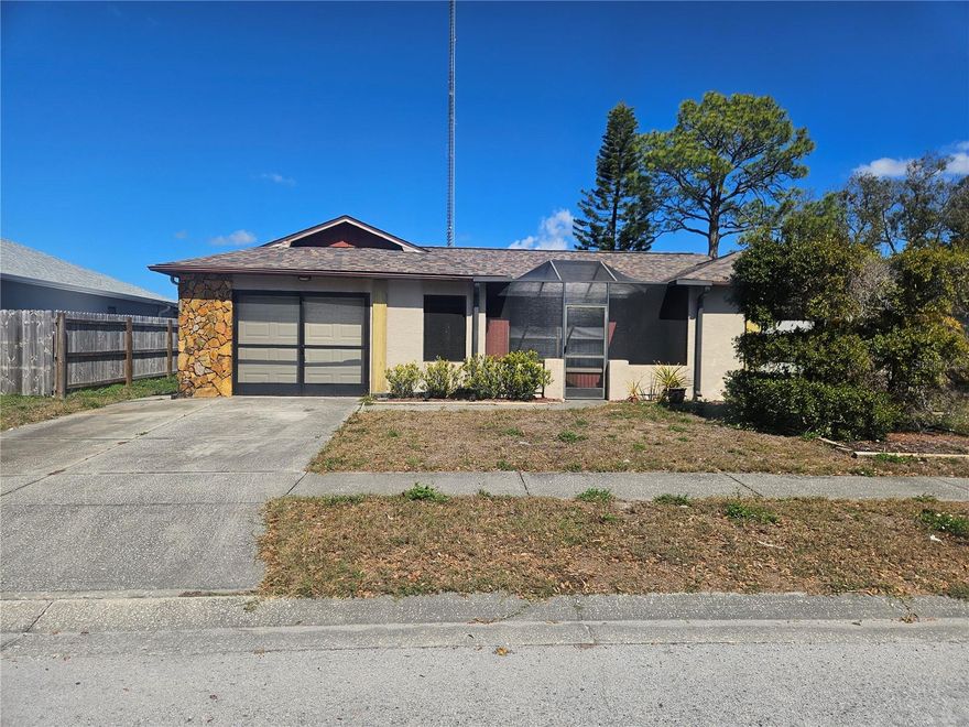 Lots of potential here. This  3 bedroom 2 bath pool home that needs some TLC, but when you are done it will be an amazing home. The lay out offers a split bedroom floor plan as well as a living room and a separate family room. The roof was done in 2017, A/C 2025, garage door is 2025 and the water heater is newer as well. Cash only due to condition of interior.