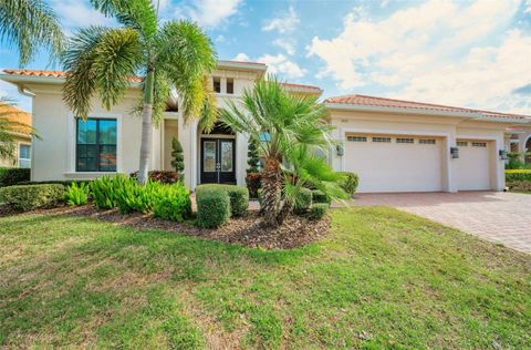 Photo of 1042 Tuscany Drive, Trinity, FL 34655 (MLS # TB8465351)