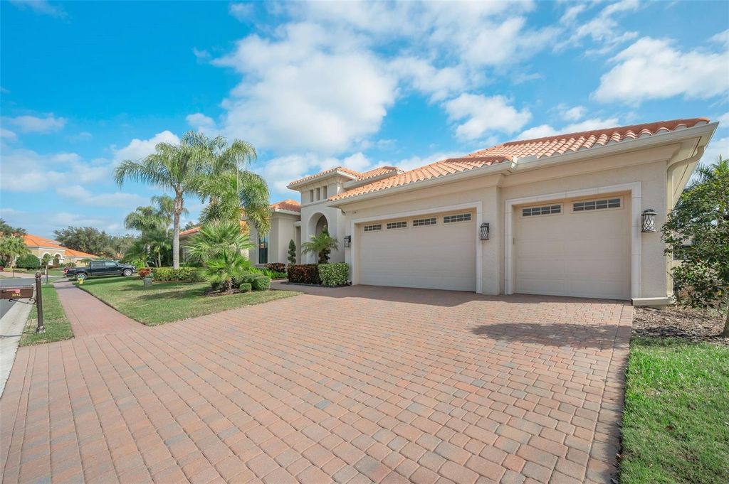 Photo of 1042 Tuscany Drive, Trinity, FL 34655 (MLS # TB8465351)