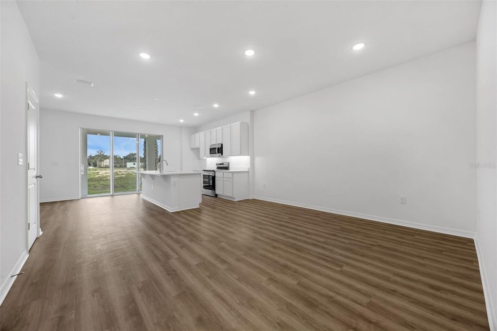 Photo of 1128 Cypress Elm Drive, Deland, FL 32720 (MLS # W7885481)