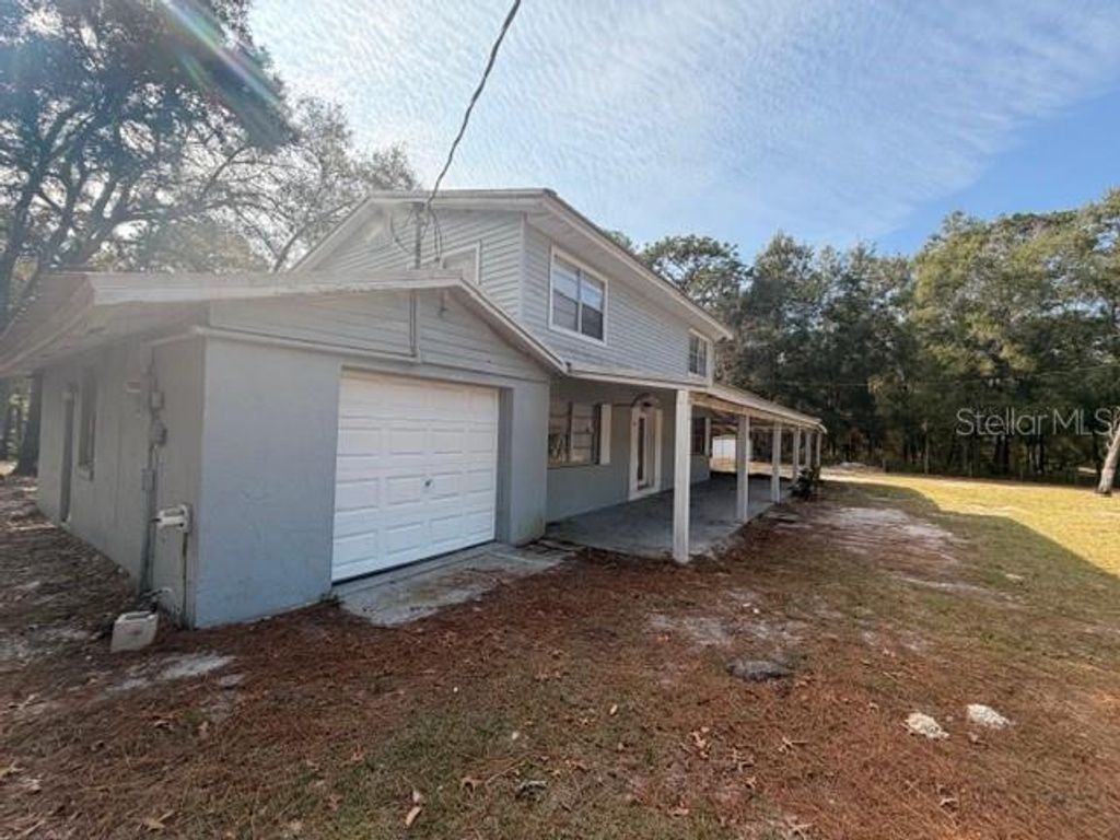 Photo of 9764 SW 153rd Lane, Dunnellon, FL 34432 (MLS # OM717948)