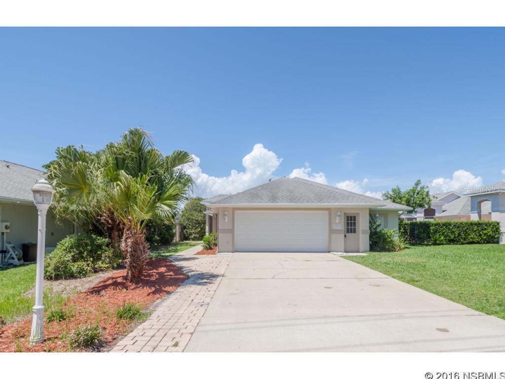 Under contract taking backups. Welcome home to this beautifully remodeled 3BR/2.5BA/2GAR POOL home located on the north peninsula of New Smyrna Beach, just minutes to downtown! This home features a super open floor plan with vaulted ceilings. The great room is a spacious 40â x 18â with two sided fireplace and wet bar. It is also open to the dining room and kitchen and features three sets of French doors. Recent upgrades include all new flooring throughout, new kitchen cabinets and bathrooms vanities, new appliances, new fans/lighting, new screens, new paint inside and out, new HVAC, garage door and more. Enjoy a cup of coffee, poolside, on your quiet lanai, or have the family over for a big BBQ. Come love life by the beach!All information taken from the tax roll and deemed reliable but not guaranteed. ;Water: City