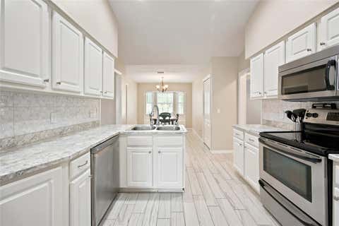 Tiny photo for 500 NE 52nd Court, Ocala, FL 34470 (MLS # OM729240)