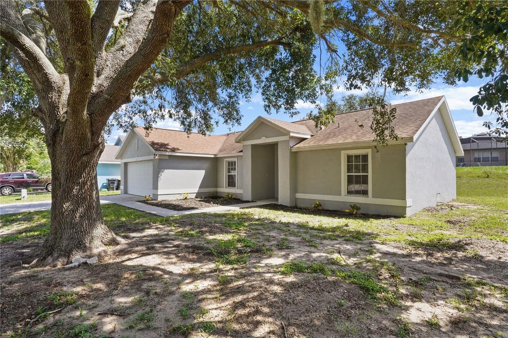 Photo of 114 Oxford Road, Davenport, FL 33896 (MLS # O6439464)
