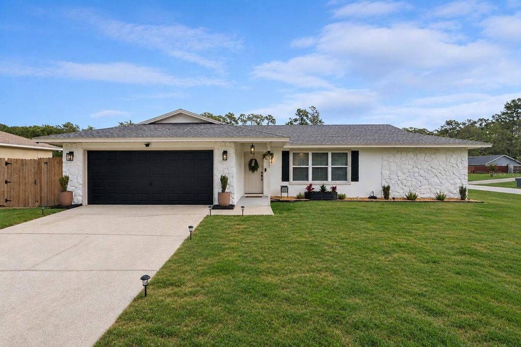 Photo of 3199 Urmey Avenue, Deltona, FL 32738 (MLS # O6416530)