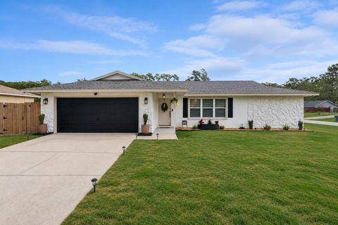 Photo of 3199 Urmey Avenue, Deltona, FL 32738 (MLS # O6416530)
