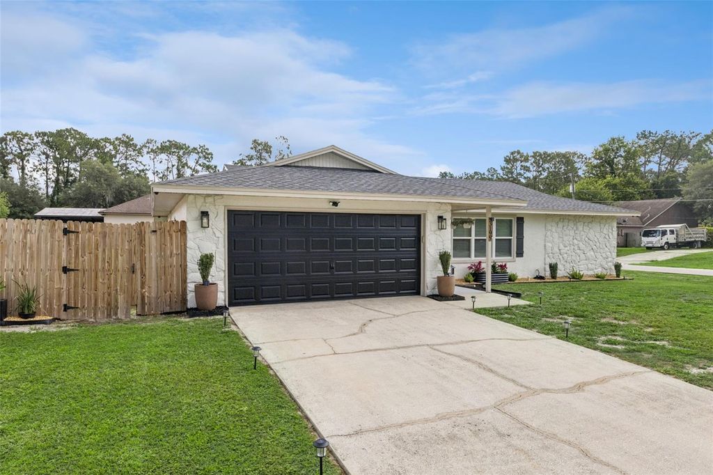 Photo of 3199 Urmey Avenue, Deltona, FL 32738 (MLS # O6416530)