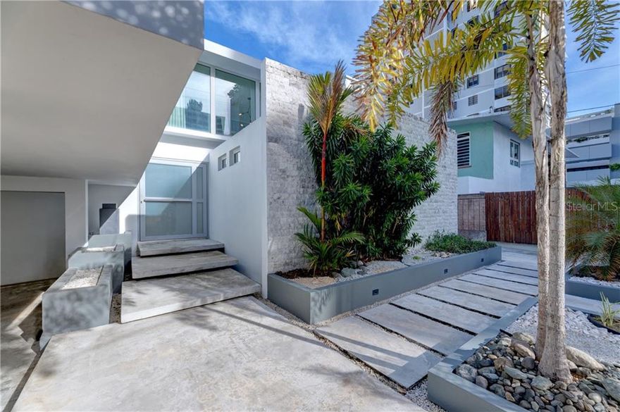 Tastefully redesigned from the ground up in 2017, this architecturally contemporary residence highlights the luxury of open floor plan living in one of the few redone single family homes located in Condado Beach. Polished terrazzo floors throughout seamlessly integrate with the floor to ceiling glass doors that open directly to the abundantly lush backyard. With just about a ¼ acre of property, 11 Manuel Rodriguez Sierra offers eastern exposure, capturing the beautiful morning light, and affording the much needed afternoon shade. 3 Bedrooms with baths on suite stretch across the second floor, as well as a full floor length outdoor terrace, interconnecting all suites to the outdoors. Kitchen with separate galley kitchen and bar, maids suite with full bath, mud room, living, dining and den , on ground floor.

The grounds offer a 4 car gated parking area, with private walk entrance from street, inground outdoor pool, sunning areas with deck , outdoor summer kitchen, sun sails to capture the comfort of outdoor living, and multiple terraces to round out this rare to find Condado Beach Home. ½ a block from the sand and sitting in the pulse of the community.

Currently tenant occupied. Available for appointment with a 48hr notice.