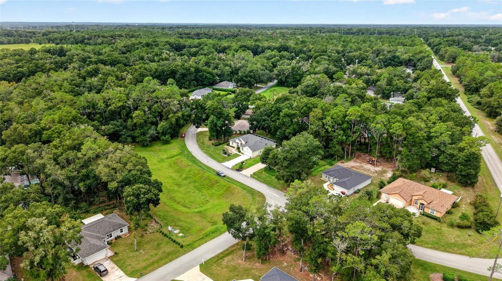 Photo of 9977 SW 192nd Circle, Dunnellon, FL 34432 (MLS # OM733520)