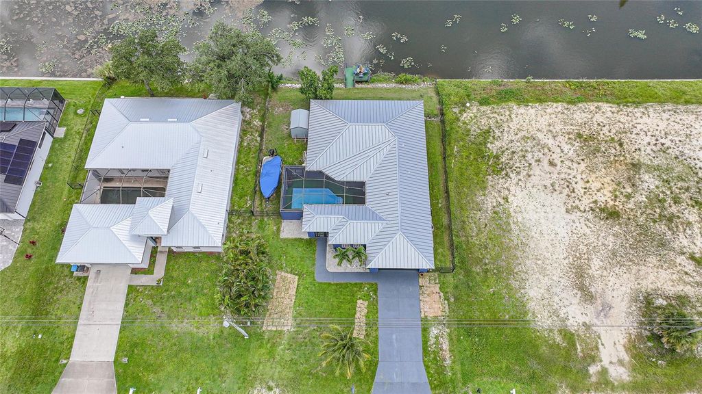 Photo of 118 SW 21st Terrace, Cape Coral, FL 33991 (MLS # C7511888)