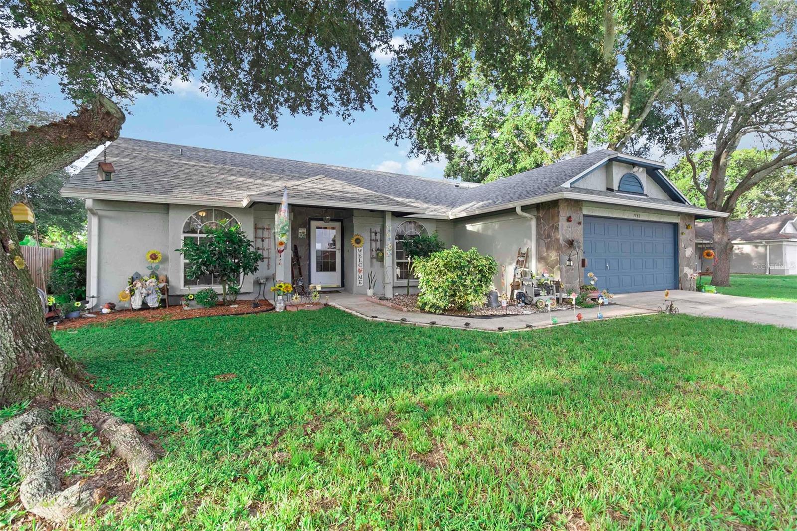 Hitting the open market for the first time, 7748 Covedale Drive is nestled in the heart of Orlando’s Robinson Hills area. This 4-bedroom, 2-bath pool home comes loaded with upgrades, including a brand-new roof, newer HVAC, newer pool motor, a fully re-insulated attic, freshly pumped septic system, and more! Built in 1986, it offers the perfect blend of suburban comfort and city convenience on a quiet street in the Gatewood community. Step inside to find a spacious 1,496 square-foot layout designed for modern living. The main living area is anchored by a cozy wood-burning fireplace, creating a warm focal point for gatherings. The fully upgraded kitchen features stylish finishes, newer cabinetry, and ample counter space, seamlessly connecting to the dining and living spaces for easy entertaining. The split-bedroom floor plan ensures privacy, with a generously sized primary suite that boasts an upgraded walk-in shower in the master bathroom. This home has been thoughtfully improved with major updates for peace of mind, including a new roof, a new HVAC system, and block construction. Outdoors, enjoy your own private Florida retreat with a screened-in pool, perfect for relaxing or entertaining. The backyard is fully fenced, with an extra-tall fence along the back for enhanced privacy, making it ideal for pets, gardening, or simply enjoying the space in peace. Mature landscaping and upgraded outdoor features add charm and curb appeal. Additional highlights include a two-car garage, public utilities, and low-maintenance living with no HOA fees. The location is unbeatable. Everyday essentials are just minutes away with nearby shopping centers, grocery stores, and dining options. Larger destinations like Downtown Orlando, Winter Garden, and Apopka are easily accessible, as well as theme parks, the Mall at Millenia, and International Drive. For outdoor recreation, Lake Apopka, Barnett Park, and the West Orange Trail are close at hand. Commuters will appreciate quick access to SR-408, SR-429, and the Florida Turnpike. Whether you’re a first-time buyer, a growing family, or simply looking for a beautifully upgraded pool home in a central location, 7748 Covedale Drive checks every box.
