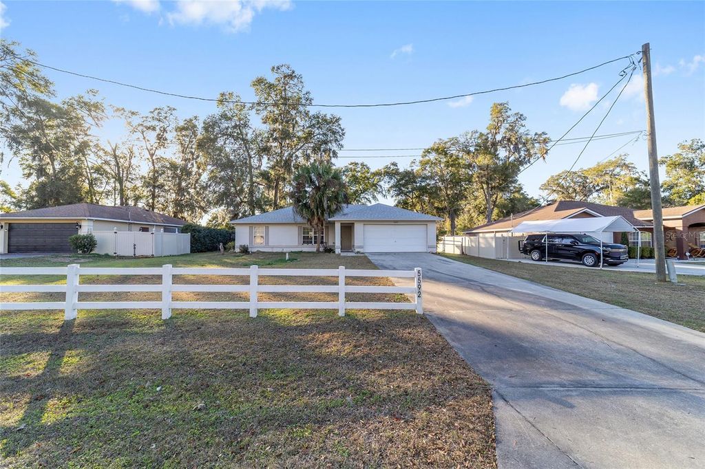 Photo of 5592 NW 57th Avenue, Ocala, FL 34482 (MLS # OM716399)