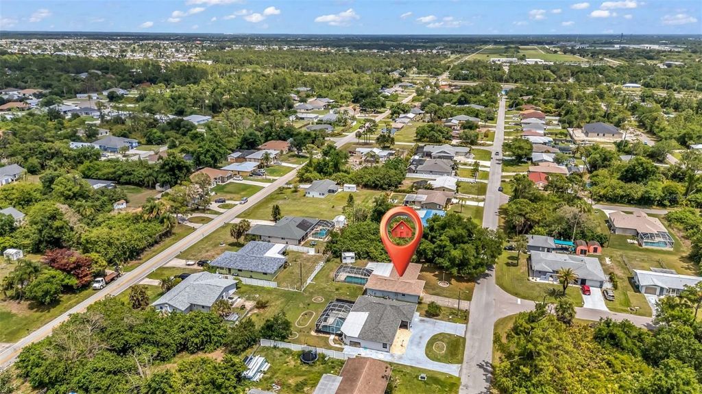 Photo of 23220 Rountree Avenue, Port Charlotte, FL 33980 (MLS # C7524433)