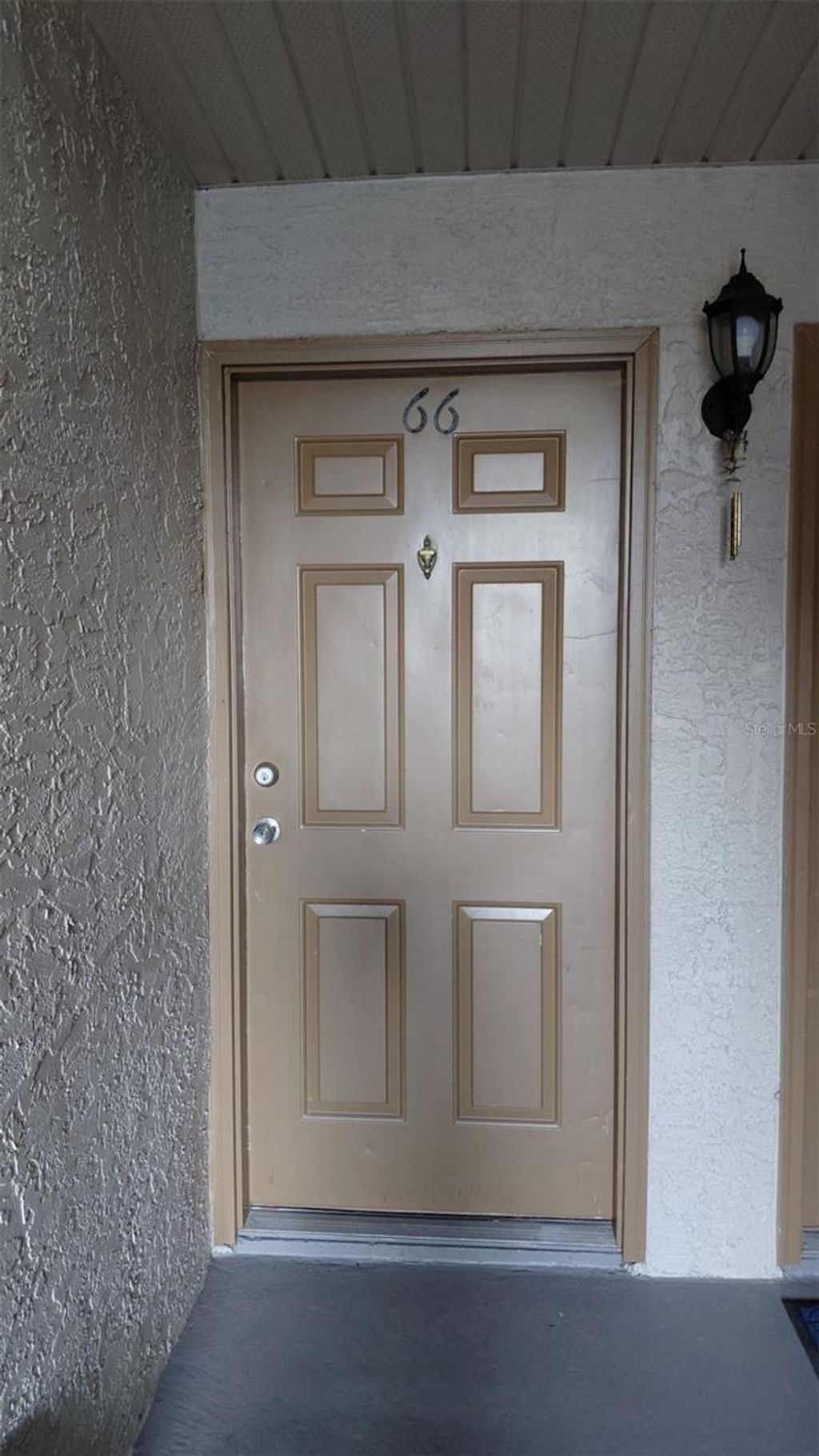 Photo of 4666 Pembrook Place #103, Orlando, FL 32811 (MLS # O6366028)