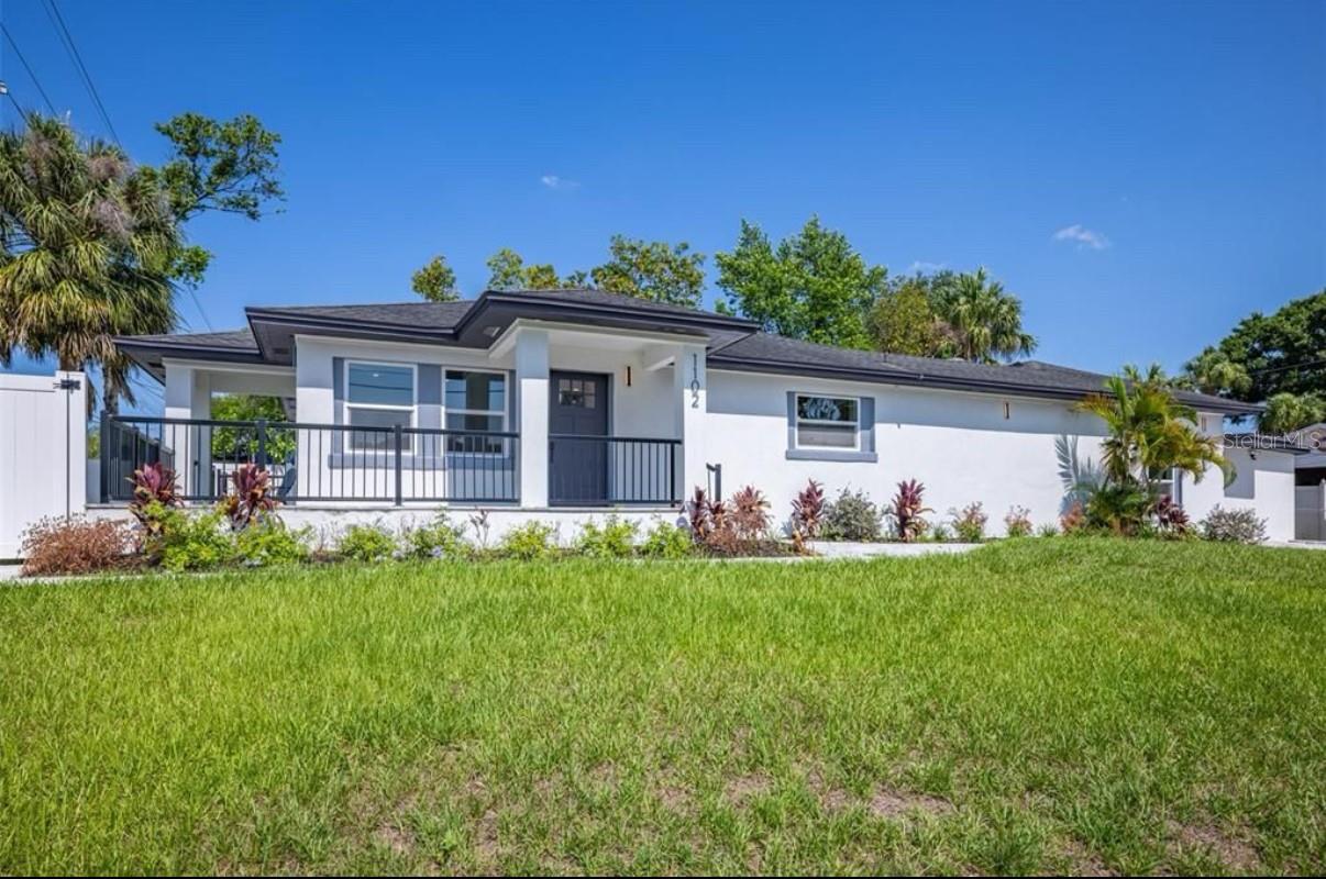 The best priced fully renovated home within Plant High School District! Perched high on a hill, this stunning like-new home offers peace of mind from flood concerns, even in the strongest storms. Located in the highly desirable NoHo neighborhood, just minutes from Downtown Tampa and Hyde Park Village, this home is within the sought-after Plant School District and has been completely updated with modern luxury in mind. Step inside to an expansive open-concept layout, featuring gleaming hardwood floors and level 5 smooth drywall finishes throughout. The massive chef’s kitchen is a true centerpiece, featuring a large cooktop, double oven, and ample space for cooking, entertaining, and gathering. The spa-like primary suite is a true retreat, featuring a wet room with a luxurious 67-inch soaking tub inside the shower enclosure—perfect for unwinding after a long day. The suite also includes a separate water closet for added privacy and comfort. Storage is effortless with custom closet organizers in every closet, maximizing space and functionality. The wraparound porch offers breathtaking views of the Downtown Tampa skyline, making it the perfect spot to unwind. Situated on a huge fenced-in corner lot, this home provides both privacy and plenty of outdoor space. Brand-new pavers add to its curb appeal and functionality. Designed for both style and security, this home features impact windows and has been updated with all-new electrical, plumbing, and AC for maximum energy efficiency. If you’re trying to get into the Plant district without a million-dollar mortgage, this is your shot. Lawn Car included. Easy to University of Tampa. Newly renovated. Chef’s kitchen. Massive primary suite.