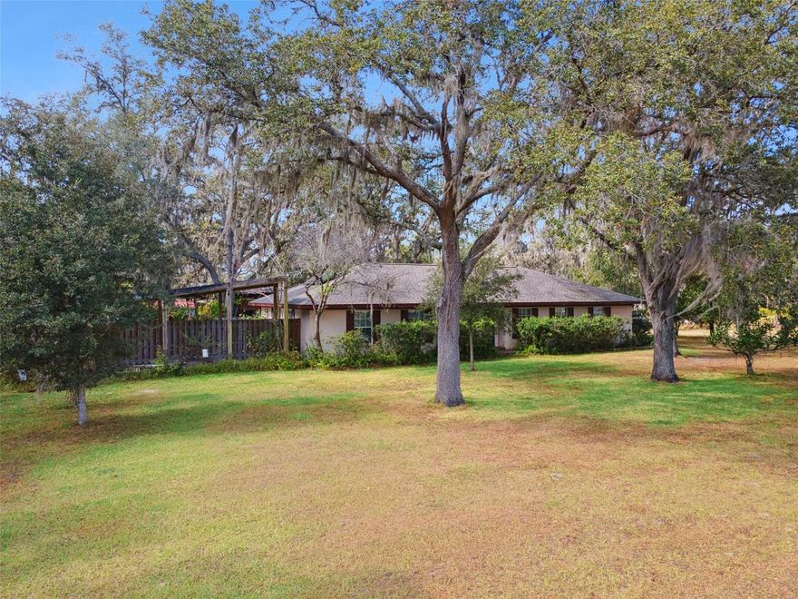 PRIVATE 5-ACRE OASIS with Upgrades Galore!  On a private dead-end road, which means more privacy and hardly any traffic!
Welcome to your dream homestead! Nestled on 5 fully fenced acres, this well maintained 3-bedroom, 2-bath block home offers the perfect blend of comfort, functionality, and rural charm. Step inside to find a cozy wood-burning fireplace, double-paned windows, and a remodeled kitchen and primary bathroom that elevate everyday living.
HOME FEATURES:
  *Solid block construction with updated roof (2020), water heater (2021), and AC (2012)
  *Spacious living areas with natural light and energy-efficient solar panels
  *Fully remodeled kitchen with beautiful quartz countertops, and fully remodeled primary bathroom 
  * Solar water heater with electric backup
  *Generator to run electric during power outages. Big enough to run major appliances and well

OUTDOOR AMENITIES:
  *Deluxe chicken coop and mature fruit trees for sustainable living
  *Two fenced field paddocks with lights, an electric back fence—ideal for livestock or horses
  *Pole barn with loft, workshop, and multiple sheds for all your tools and toys
  *3 RV hookups, two 50 amp and one 30 amp, and outdoor lighting for convenience and security
  *Inviting inground solar heated pool and relaxing electric hot tub for year-round enjoyment
       
This property is a rare find for those seeking space, privacy, and versatility. Whether you're starting a hobby farm, hosting family 
gatherings, or simply enjoying the peace of country life, this home has it all.