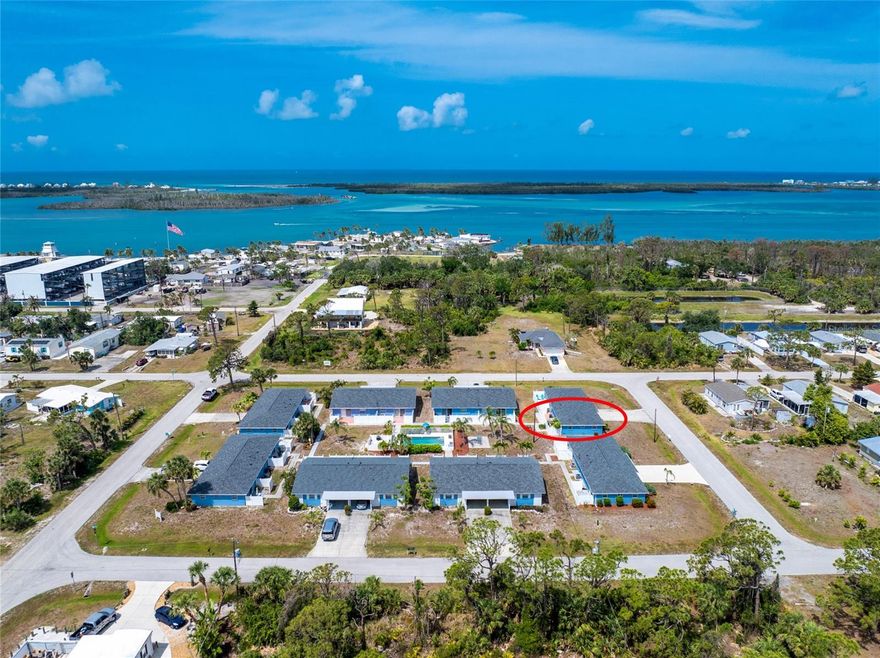 Walk, bike, or take a golf cart to Stump Pass Marina! This charming two-bedroom, one-bath half of a duplex in the Stump Pass Condominium Development is in an unbeatable location. With a 2023 roof, impact windows, and a 2020 A/C, plus being situated in the X flood zone, this home offers peace of mind. Step inside to a cozy kitchen with tile flooring, ample cabinet and countertop space, and a stylish tile backsplash. The light-filled living and dining room combo features sliding glass doors that lead to a private, paver patio—ideal for grilling or relaxing under the stars. For added convenience, there’s a laundry closet in the patio area.  Both bedrooms have reach-in closets, and the bathroom includes a tiled shower/tub combo. The unit provides easy access to the community heated pool, grilling patio, and gathering area—the perfect spot for unwinding with neighbors after a day on the water or at the beach. Fully furnished and turnkey, this 2/1 condo is just a short distance to the intercoastal, marina, and a newly renovated restaurant. Perfect for seasonal or full-time living or as a retirement getaway from the cold weather. Just 5 miles from Dearborn Street in downtown Englewood, less than 5 miles to Englewood Beach with several local restaurants, tiki bars, live entertainment, and more. Plus, 1.5 miles to Ann & Chuck Dever Regional Park with 315.6 acres of outdoor recreation, including a heated competition pool, a fitness center, a multi-purpose gym, a community garden, and the Oyster Creek Waterfront Trail connecting to Cedar Point Environmental Park for scenic wildlife views. This is an exceptional investment opportunity, don’t wait, contact us to schedule your private showing!