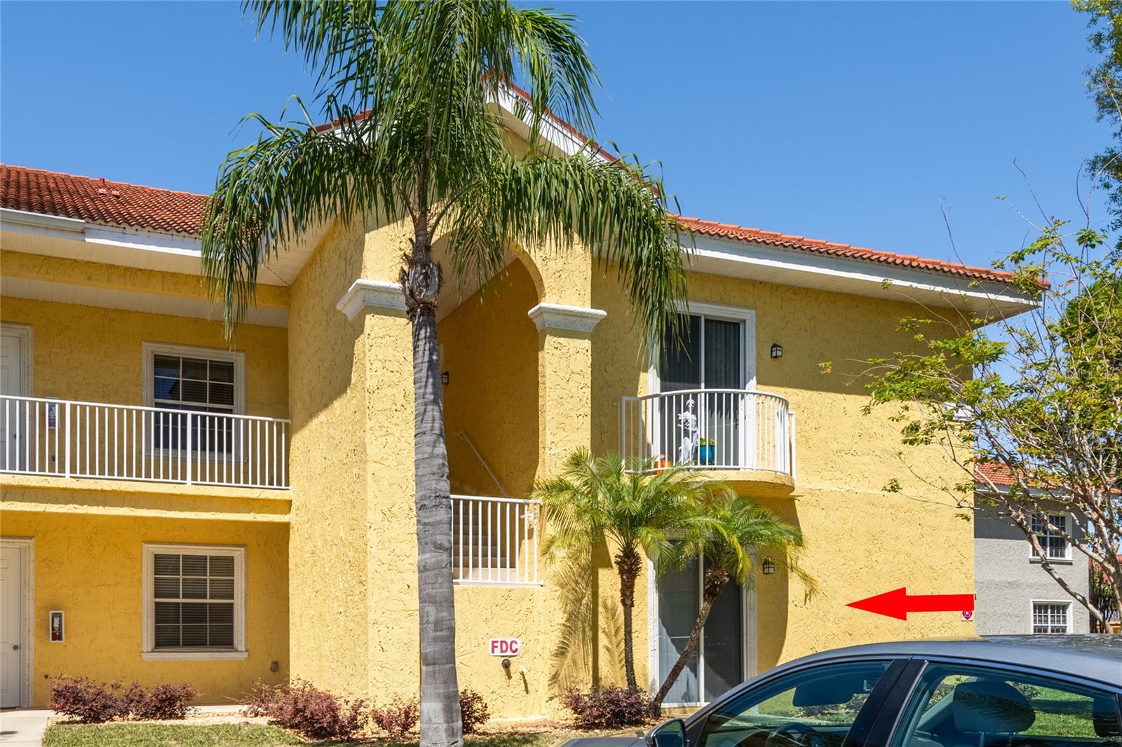Here is your 2 bedroom/ 2 bath first floor end unit for an affordable price. It won't last long! Decide where to have your morning coffee out back with a lovely garden view or out front of your kitchen that has a patio view. End unit pluses include the options of opening the sliding glass doors on each end of the condo to feeling the warm Florida breezes. End units also make the condo feel bigger. Come see today! Take part of resort living with style.
All furnishings included. Inside laundry room. Plenty of cabinets and even an extra patio just off the kitchen. Large screen back patio can be accessed from the living room sliding glass doors or the Master bedroom. Plenty of parking for guests and golf carts. Caliente resort membership is required and is not included in the maintenance fee. All room dimensions should be verified.