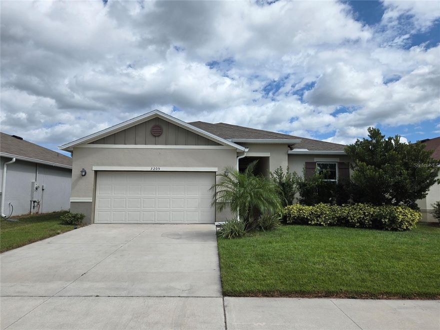 This beautifully maintained and freshly painted property features 4 spacious bedrooms and 2 bathrooms, along with a covered and enclosed lanai perfect for relaxing or entertaining. The home boasts an open floor plan where the kitchen seamlessly integrates with the living and dining areas, creating a welcoming and functional space. The living room is equipped with built-in speakers, allowing you to connect your TV or stereo for an enhanced sound experience. The kitchen includes a generous island with a roomleg design, ideal for casual dining or meal prep. The primary suite offers a spacious bathroom complete with a large walk-in closet, dual sinks, and a walk-in shower. Additional highlights include an interior laundry area with washer and dryer (not warranted by landlords), and a freshly painted garage floor with a garage door opener. Schedule your showing today and discover all the potential this home has!