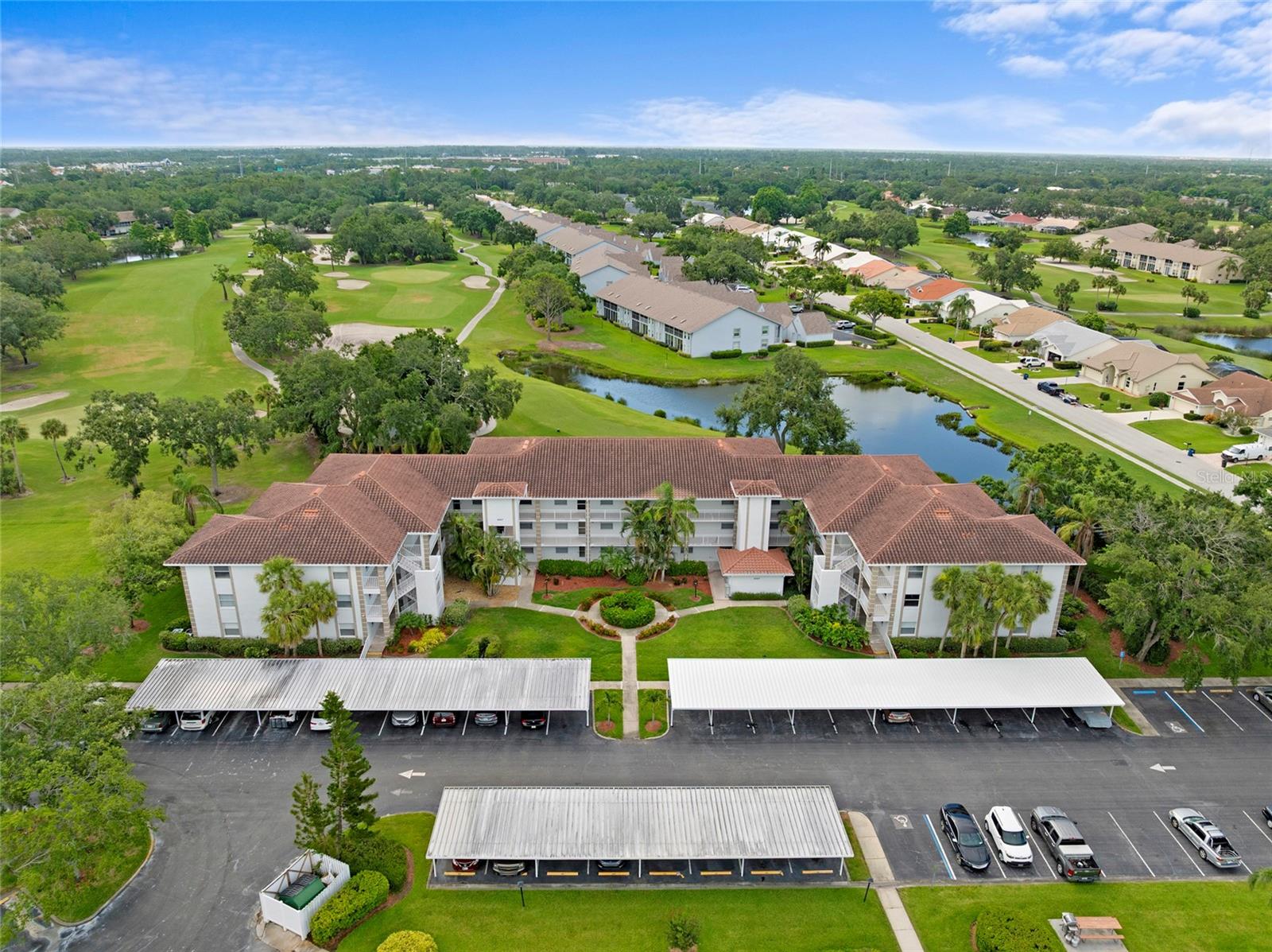 Welcome to the enchanting Terraces of Tara Community, where your dream of a golf club lifestyle can become a reality! This delightful 2-bedroom, 2-bathroom condo is not just a home; it’s a lifestyle choice waiting for you. Step inside to discover a spacious eat-in kitchen to your left, perfect for gatherings and culinary adventures. Featuring newer stainless steel appliances and an abundance of cabinets, this kitchen seamlessly flows into the open-concept living room, creating an inviting atmosphere for entertaining. The living room is generously sized and filled with natural light, thanks to sliding doors that lead to a spectacular screened-in lanai. Imagine sipping your morning coffee here while taking in breathtaking views of the golf course on one side and a serene lake on the other—your personal retreat! Designed for privacy, the split-bedroom floor plan offers an oasis for you and your guests. The expansive primary bedroom features its own slider to the lanai, ensuring you never miss those stunning views. The ensuite bathroom is equipped with a walk-in handicap shower for added convenience. Your guests will feel right at home in the cozy guest room, which, along with the guest bathroom and laundry area, is thoughtfully positioned at the front of the condo. With an abundance of windows and sliders, this home is bathed in natural light, enhancing its warm and welcoming ambiance. A Class "A" equity golf membership to Tara Golf & Country Club is conveyed with this property, offering a wide range of amenities. This membership allows you to connect with friendly neighbors while enjoying championship golf, tennis, water sports, and fitness activities that enhance your lifestyle. With exceptional dining options and a variety of resort-style activities, you'll have endless opportunities for socializing and creating lasting memories. Don’t miss out on the chance to elevate your living experience in the Terraces of Tara. Book your showing today!