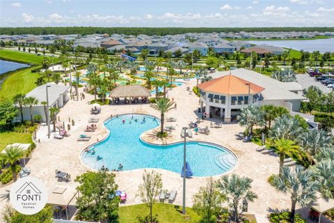 Photo of 3141 Paradox Circle #104, Kissimmee, FL 34746 (MLS # O6373831)