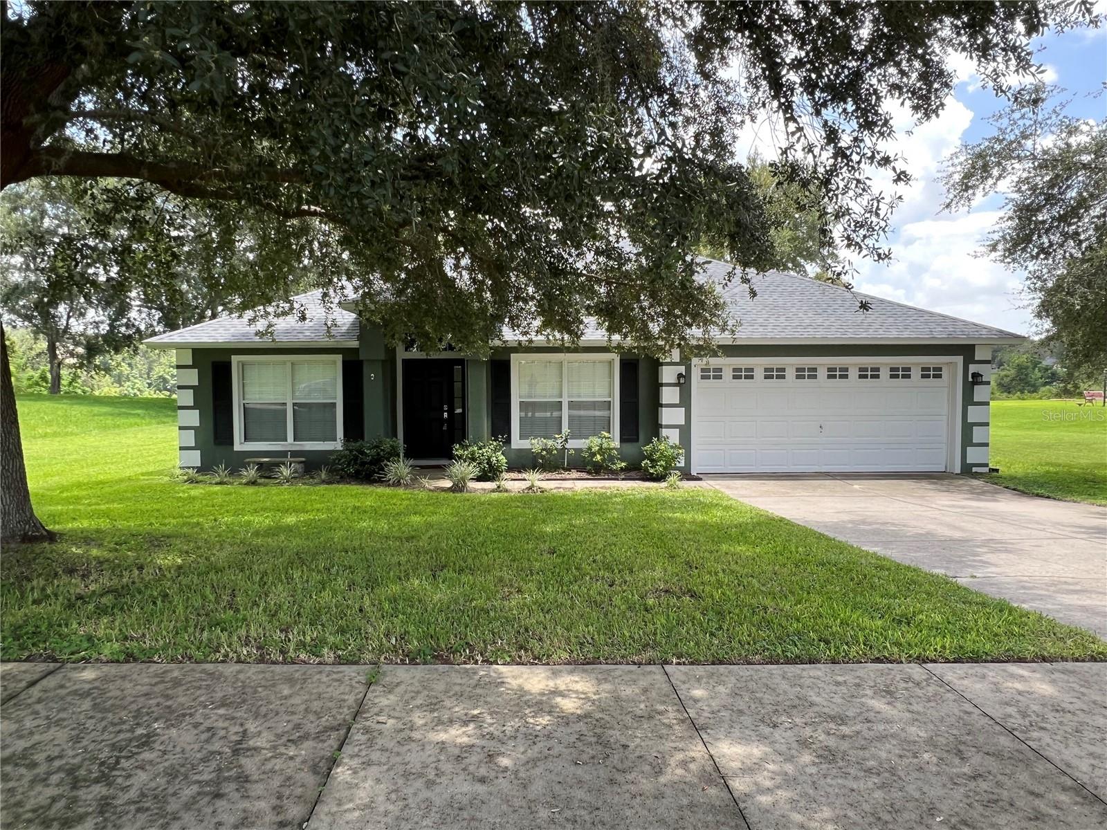 Bright & Spacious 3?Bed · 2?Bath Home on Generous 0.67-Acre Lot with water front!
Welcome to a beautifully ONE OWNER well maintained single-family residence in the serene Oak Valley neighborhood of Minneola. Built in 2004, this well-designed home features a split-bedroom floor plan ideal for privacy and comfort — including three bedrooms and two full bathrooms. Step inside to an open layout connecting formal living and dining spaces, plus a roomy family room ideal for gatherings or relaxing evenings. The eat-in kitchen includes a convenient breakfast bar and pantry. Outside, enjoy over half an acre of lush, landscaped yard — perfect for play, pets, or hosting friends. A covered and private lanai provide the ideal setting for Florida outdoor living. 2-car garage and paved driveway. Convenient to Florida’s Turnpike, Orlando metro, local parks, shopping, and dining.