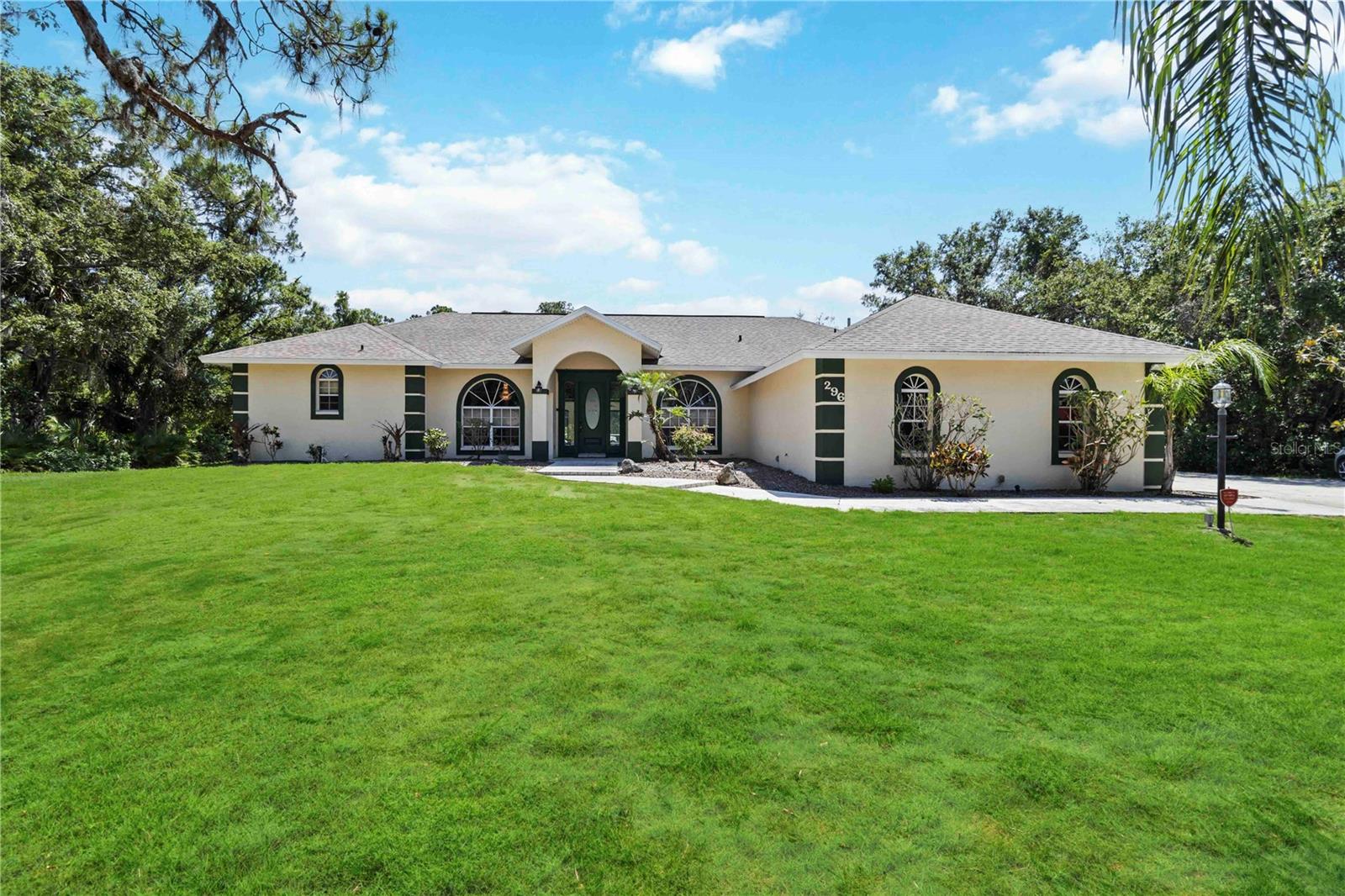 **THIS PROPERTY QUALIFIES FOR A LENDER INCENTIVE (up to $8,000) IF USING PREFERRED LENDER. INQUIRE FOR MORE DETAILS.** & SELLER IS OFFERING A $25,000.00 CREDIT toward rate buy down/closing cost with acceptable contract.
Welcome to your private retreat nestled in one of Osprey’s most desirable enclaves. This beautifully situated home rests on a lush greenbelt lot that borders the fairways of a nearby golf course, offering tranquil views and peaceful surroundings. With no rear neighbors, you'll enjoy the privacy and serenity that your 1 acre+ lot affords. Have a boat or RV? This community is deed restricted but there is plenty of space to build an oversized garage to house vehicles or create a dream workshop. Inside, you'll find a timeless blend of comfort and sophistication. The spacious interior boasts high ceilings, large windows that fill the rooms with natural light, and an open floorplan that seamlessly connects the living spaces. Nestled amid lush greenery and serene surroundings, this property stands out as more than just a house—it's a haven awaiting its next resident. Designed with both comfort and elegance in mind, every detail speaks to a lifestyle where relaxation and convenience coalesce effortlessly. Step inside, and you'll discover a space that beckons you to make it your own sanctuary.
Located in a quiet, upscale neighborhood with a charming, country-like feel, this home is just minutes from everything that makes Sarasota County one of Florida’s most sought-after destinations. The world-renowned Nokomis Beach and Siesta Key, are a short drive away, offering sun, surf, and sand any time you desire. Pine View School, consistently ranked among the top public schools in the nation, is only a few minutes away. Outdoor enthusiasts will love the easy access to the Legacy Trail, a scenic multi-use path perfect for biking, running, and leisurely strolls through nature preserves. Whether you're looking to settle into a peaceful primary residence or seeking a second home close to golf, beaches, and top-tier schools, this home offers the perfect balance of nature, convenience, and lifestyle.
The home features 5 bedroom and 3.5 bathrooms, and an oversized 2 car garage. The open concept floorplan and expansive covered patio are perfect for entertaining. The main master suite has vaulted ceilings, sliding glass doors leading to the pool and spa, an oversized walk-in closet, and the bathroom is plumbed for a soaker tub. On the other side of the home there are 4 more bedrooms, one of which also has an en-suite bathroom. For added peace of mind, this home comes with many newer updates such as: Roof 2016, Pool heater 2024, Septic tank 2024. Both HVAC units and Pentair pool Wi-Fi controlled equipment have been updated and home has been replumbed with CPVC.
View the virtual tour or call today to schedule a showing before this home is gone!