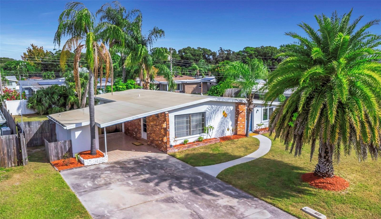 Coastal living at its best!!! Enjoy the beauty of an updated home paired with Dunedin’s vibrant coastal lifestyle!!! Perfectly located just blocks from the famed Pinellas Trail and less than a mile to downtown, you can hop on your golf cart and explore all that makes Dunedin one of Florida’s most beloved coastal towns!!! Enjoy the charm of Dunedin’s iconic painted oranges by a renowned local muralist, adding a unique coastal flair to your home! Light, bright, and move-in ready, this charming home boasts vaulted ceilings with exposed beams, and a brand-new kitchen, bathroom and luxury vinyl flooring throughout. The spacious fenced backyard with double gate is perfect for a boat or a future pool, while the oversized driveway offers plenty of parking.
Prime Location & Lifestyle... Just blocks from the Pinellas Trail, downtown shops, waterfront dining, craft breweries, farmers markets, and stunning sunsets at Edgewater Park. Enjoy Dunedin’s festivals, street events, and vibrant coastal lifestyle all in one stylish, updated home!
Key Features... Updated Kitchen & Bath with Stainless Steel Appliances, Vaulted Ceilings with Exposed Beams, Spacious Fenced Backyard with Double Gate, Oversized Driveway, Blocks from Downtown, Pinellas Trail, and Waterfront Living with America's favorite Beaches!!
Move-in ready and full of charm!!! See... Fall in LOVE... Make it YOUR own!!!