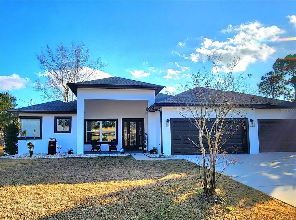 Photo of 43 Fenimore Lane, Palm Coast, FL 32137 (MLS # FC315919)