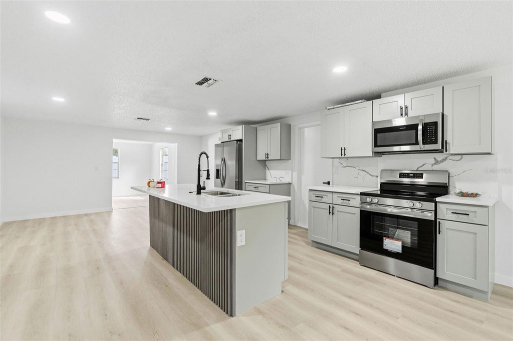 Photo of 8525 Briar Patch Drive, Port Richey, FL 34668 (MLS # TB8551279)