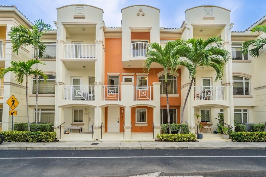 One or more photo(s) has been virtually staged. Spacious 3-story townhouse offering 3 bedrooms and 2.5 bathrooms. Enjoy an open floor plan with a kitchen bar, a living room that opens to a balcony, and a front porch that welcomes you home. Upstairs features a bedroom with its own front-facing balcony and a double vanity bathroom. Additional balconies in front and back create plenty of outdoor space to relax or entertain. The 2-car attached garage adds convenience.