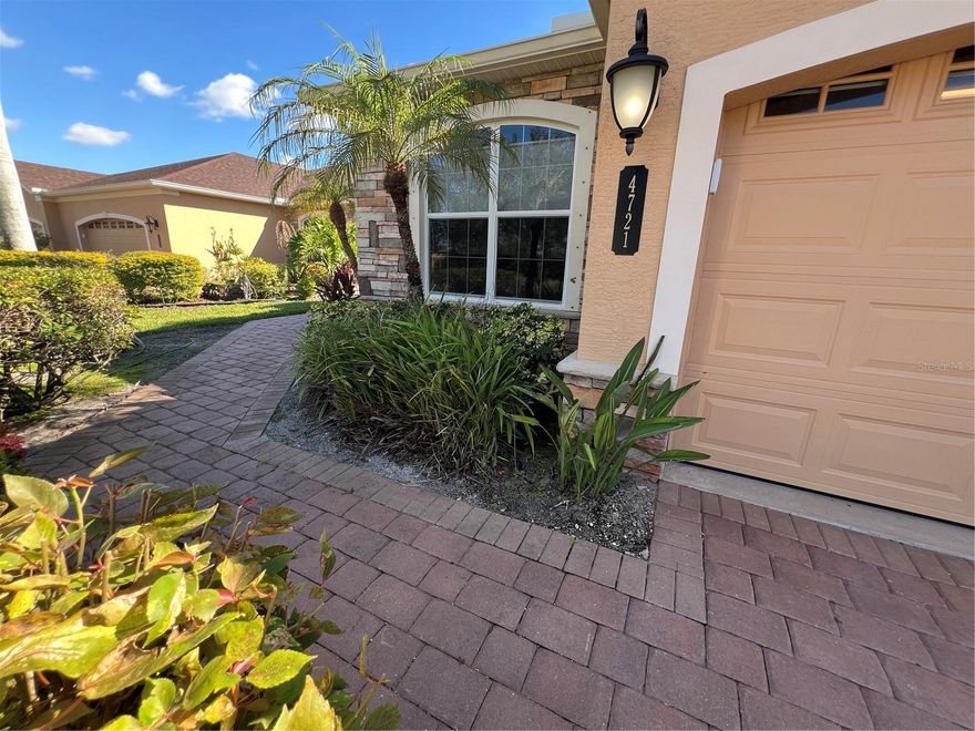 The Villas of Turnberry Trace offer a tranquility seldom found. This property provides a coveted, center view of the fountain, bringing your water view in to your living room and primary bedroom. Nestled in North Port, between Sarasota and Punta Gorda, Turnberry Trace offers the perfect blend of serene surroundings and accessibility to everything Florida has to offer.....world-renowned beaches to the north and fantastic fishing to the south!  It's a great locale for year round residents, seasonal visitors and investors alike.  The villa itself offers a very spacious primary bedroom with en suite and walk-in closet and two additional bedrooms with a shared bath for your guests to be equally as comfortable. This particular homeowner uses the third bedroom as a home office, allowing great work from home capability. The kitchen is well-appointed with solid wood cabinetry, granite counters, stainless appliances rounded off with an island breakfast bar. The hall laundry closet comes complete with a washer and dryer. But of course, the best part of living in Florida is the outdoors. Your spacious lanai grants you a respite to sit quietly with a book and your morning coffee. A spacious garage allows plenty of storage for bikes, golf cart, fishing poles....anything you enjoy in the sunshine! Certainly wander to the community pool if you're feeling a bit more social. Turnberry Trace is a very welcoming community, with the safety of gated access. With it being maintenance free, all you need do is ENJOY for whatever time you're here!