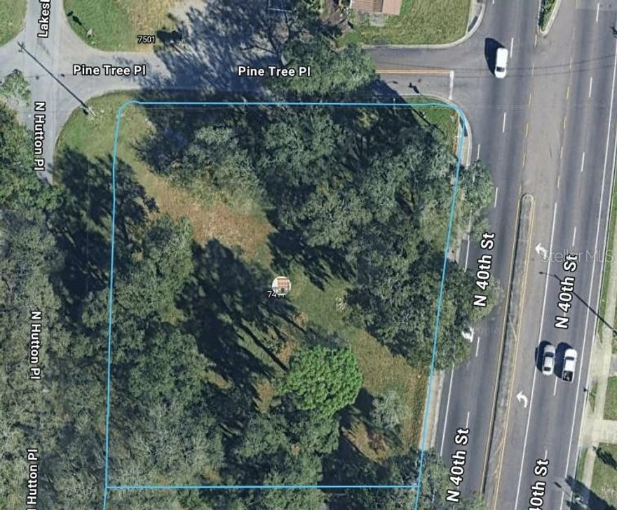Position your next commercial project on a scarce CG–Commercial General zoned infill parcel in Tampa. 7411 N Hutton Pl offers approximately ±31,185 SF (±0.72 acres) of vacant commercial land near the N 40th Street & E Yukon St corridor—supporting convenient access and connectivity to surrounding neighborhoods and major Tampa arterials. The site is well-suited for a range of neighborhood-serving retail, service, and office concepts consistent with CG zoning (buyer to verify all permitted uses and development requirements including utilities, access, stormwater, setbacks, and parking). ZIP 33610 features a population of ~45K, median age ~34, and median household income of ~$49.8K—supportive fundamentals for everyday retail and service demand. Zoning: CG – Commercial General; Land area: ±31,185 SF (±0.72 AC) Proximity to N 40th St for convenient access and strong corridor exposure ~16,500+ AVPD on N 40th St.
Infill location with established surrounding rooftops and everyday service demand drivers Strong suitability for neighborhood-serving retail/service/office uses