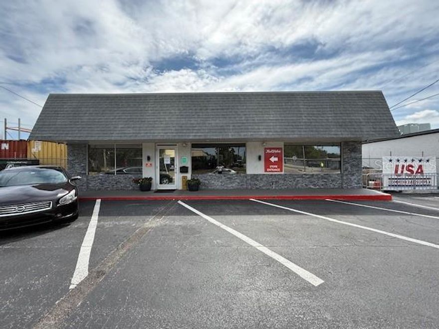Can be sold with 9501 N. Nebraska Ave. See MLS #TB8502833 for 2 buildings with over 6000 square feet. 
Prime retail space is now available in the heart of North Tampa, ideally situated near the newly redeveloped University Mall (Uptown) district.
The property features 3,312 square feet of fully climate-controlled space, suitable for a wide range of uses including retail, office, and other commercial applications. The building has been recently renovated both inside and out, with updated restrooms and modern finishes throughout.
The layout includes three private offices, a conference room, a renovated breakroom, and a separate climate-controlled garage/storage area with a garage door and 10-foot ceilings. Ample parking is available at both the front and rear of the building.
Located within the Central Business District, the property offers convenient access to Downtown Tampa and major interstate highways, making it an excellent choice for a variety of businesses.