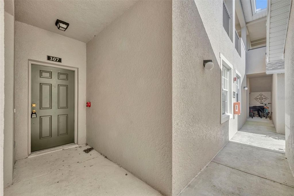 Photo of 9435 Myrtle Creek Lane #307, Orlando, FL 32832 (MLS # O6393385)