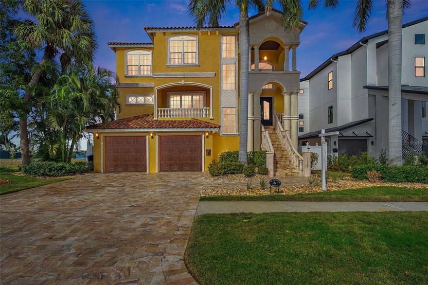 Seller will consider short term 12-24 month owner financing for a portion of the purchase price. ELEVATED WATERFRONT SANCTUARY! 13FT ELEVATION WITH FLOOD INSURANCE ANNUAL PREMIUM UNDER $1,000. This residence will captivate you with  sweeping views of Tampa Bay.  Imagine a home that provides open water views all while reaping the benefits of natural protection from Ross Island / Weedon Island preserve allowing you to keep a large vessel in the water in your very own backyard. Direct access to Tampa Bay no bridge restrictions. This mediterranean style home features 5 bedrooms, 3 full bathrooms, and a main level powder 1/2 bathroom perfect for guests. Ground floor garage has epoxy finish and easily can accommodate 4 cars.  This home also features an elevator with ground floor access and a landing on each level of the home. Main living level is complete with a powder bath, a gourmet kitchen complete with Thermador double ovens, gas cooktop, built in refrigerator and freezer. An oversized island with prep sink.  Large pantry, custom cabinetry, and a breakfast nook all overlooking the water. Generous sized living room off of the kitchen with sliding pocketing doors that lead to a balcony with plenty of room for outdoor dining. Also on the main level is a formal dining room, 2 bedrooms and one full bathroom. 3rd level features a loft complete with built-ins perfect for an at home office or homework station. Large utility room with AV connections. A substantial primary suite with private balcony, two true walk-in closets, and a breathtaking en-suite bathroom. Primary bedroom and bathroom have such incredible views you might have a hard time getting out of bed before catching the breathtaking sunrises! Primary bathroom also features a large walk in shower with dual shower heads, rain head and 6 therapeutic body sprayers. Also on the 3rd floor are 2 additional bedrooms that share a full bathroom with tub/shower combo. Backyard is lush and tropical with mature landscaping ensuring ultimate privacy. Outdoor kitchen complete with natural gas grill, hibachi grill, a smoker, sink, and mini fridge. Saltwater pool with gas heated spa and a fire pit! There is nothing this backyard is missing. Quality built composite dock, newer seawall, and a 13k boatlift. 3 HVAC units and a nearly whole house Generac generator which means not even a power outage will stop you from living your best Florida life in this home. Quick and convenient access to TIA and Albert Whitted private airport. Ride your bike, take your golf cart, or boat to Downtown St Petersburg. 25 min to our world famous white sand beaches. Over 7500 total square feet under roof.   Incredible travertine floors, decks and driveway as well as hand scraped wood floors and stairs. Make an appointment to see this home and you won't regret it!