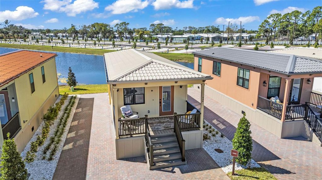 Photo of 6165 Talon Bay Drive #139, North Port, FL 34287 (MLS # TB8467658)