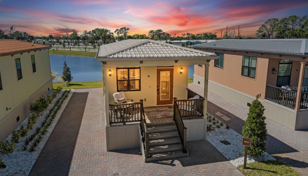 Photo of 6165 Talon Bay Drive #139, North Port, FL 34287 (MLS # TB8467658)