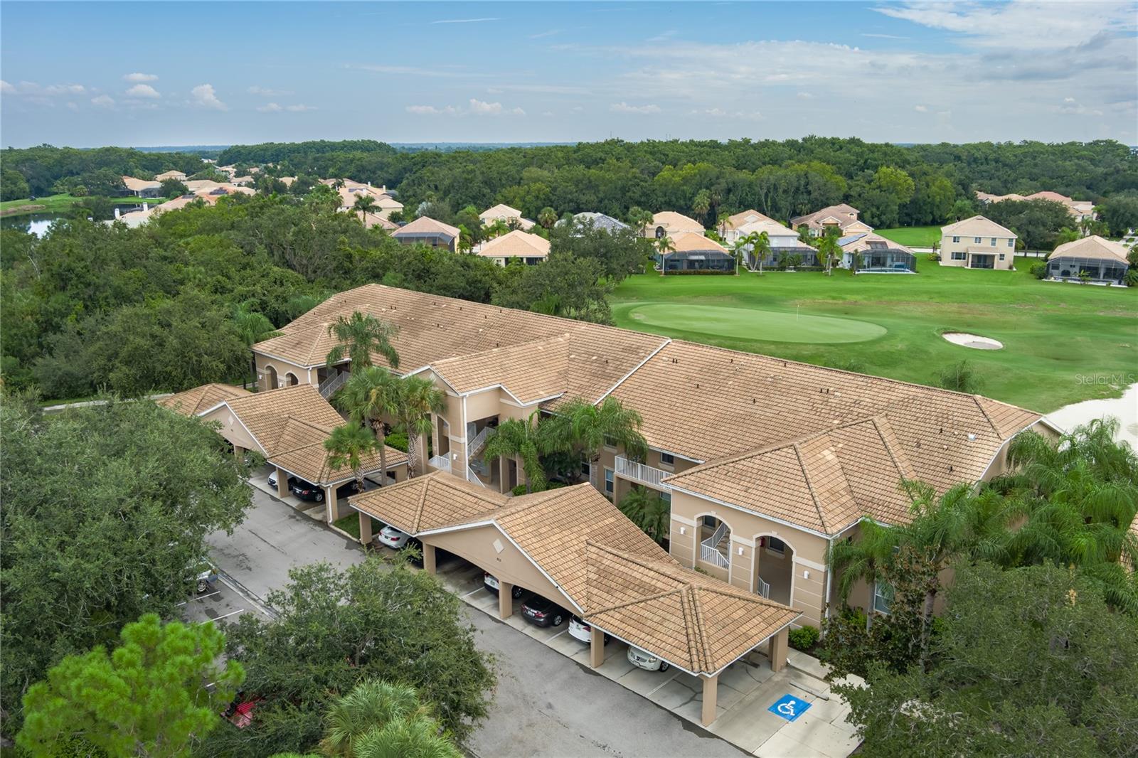 This beautiful 2/2 second floor condo with Golf Course Views and Screened Balcony in the fabulous gated Stoneybrook community of Heritage Harbour is the perfect place to call home and enjoy the Florida Lifestyle!! The Open Floor Plan is spacious and provides an idyllic setting for relaxing or entertaining guests. Enjoy the panoramic views from the screened Balcony which provides a tranquil retreat for morning coffee, reading a book, or hosting intimate gatherings. Parking is no hassle since the unit comes with an assigned, covered, carport space. Conveniently situated in a highly sought-after location, you will have easy access to numerous amenities including a Clubhouse with Restaurant, recreation center, fitness center, tennis courts, pickleball courts, volleyball court, bocci ball courts, 2 pools and a hot tub. Located near major transportation routes ensures easy commuting to Tampa, St Pete, Sarasota, and Bradenton. World Class Beaches, Shopping, and Medical Facilities are just minutes away. Don't miss this incredible opportunity to own a "Piece of Paradise"!!
